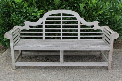 Lot 1513 - Lutyens style teak bench