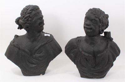 Lot 894 - Rare pair of early carved stone niche busts of an African man and woman, pierced to underside of bases for mounting, 50cm high Provenance: Said to have been acquired by the previous owner from Bris...