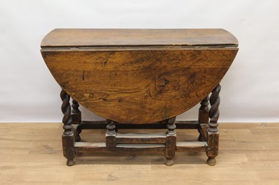 Lot 1516 - 17th century style oak drop leaf table, elliptical hinged top on barley twist and block understructure, 120 x 105cm