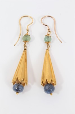 Lot 570 - Pair of Etruscan revival gold, emerald and sapphire bead pendant earrings, each with a emerald bead suspending a gold tassel with sapphire drop, 50mm.