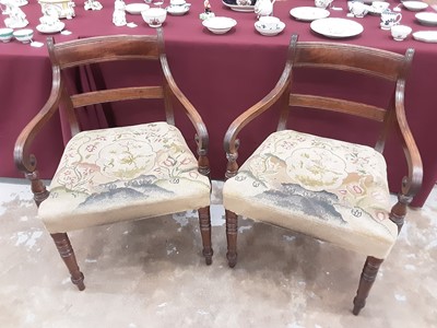 Lot 1518 - Set of eight Regency mahogany dining chairs, each with bar back and tapestry seat on ring turned legs, to include a pair of carvers