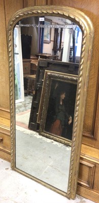 Lot 1522 - Victorian gilt gesso arched mirror, with rope twist frame, 147 x 70cm