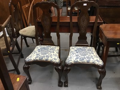 Lot 922 - Set of four Dutch carved walnut chairs with drop in seats