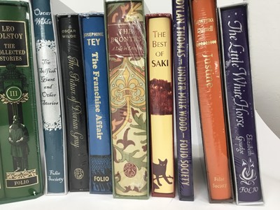 Lot 2011 - Twenty volumes of unopened Folio Society volumes, including Tolstoy, Dickens, du Maurier, Oscar Wilde