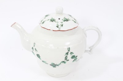 Lot 192 - Bristol ogee shaped teapot and cover, circa 1772, with green-painted swags of flowers, the spout and rim of cover painted red, marks to base, 15.5cm high