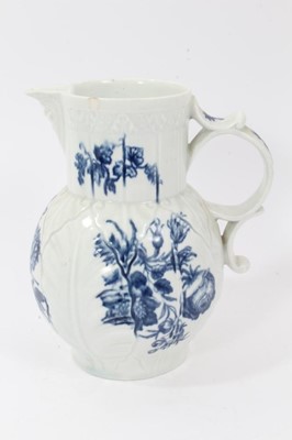Lot 194 - Worcester cabbage leaf moulded mask jug, circa 1770, decorated with flowers, 20cm high