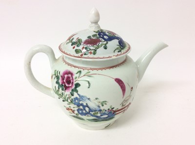 Lot 195 - Liverpool teapot and cover, circa 1770, decorated in the famille rose style with a crane in a garden, 15cm high