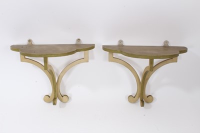 Lot 896 - Pair of painted wooden Colefax and Fowler wall brackets each with trefoil form shelf on scrolling supports, 27cm wide. From a commission by Lord and Lady David Cholmondeley