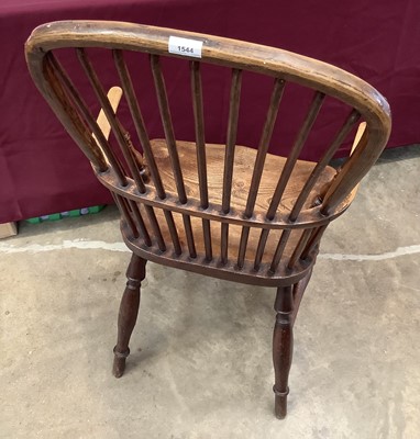 Lot 1097 - Mid 19th century Windsor elm and ash elbow chair, East Midlands.