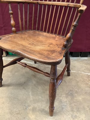 Lot 1097 - Mid 19th century Windsor elm and ash elbow chair, East Midlands.