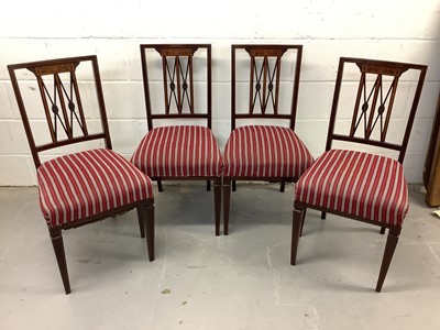 Lot 1545 - Set of four Edwardian mahogany and marquetry inlaid salon chairs