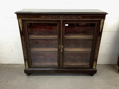 Lot 1546 - Victorian ebonised, boxwood line inlaid and gilt metal mounted  glazed bookcase