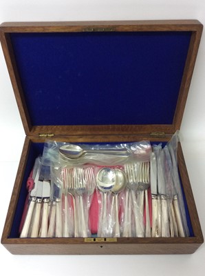 Lot 442 - Contemporary silver cutlery canteen comprising- eight dinner forks, six dinner knives, six dessert forks, eight desert knives, six soup spoons, eight desert spoons, (Sheffield 1989), maker Argentum...