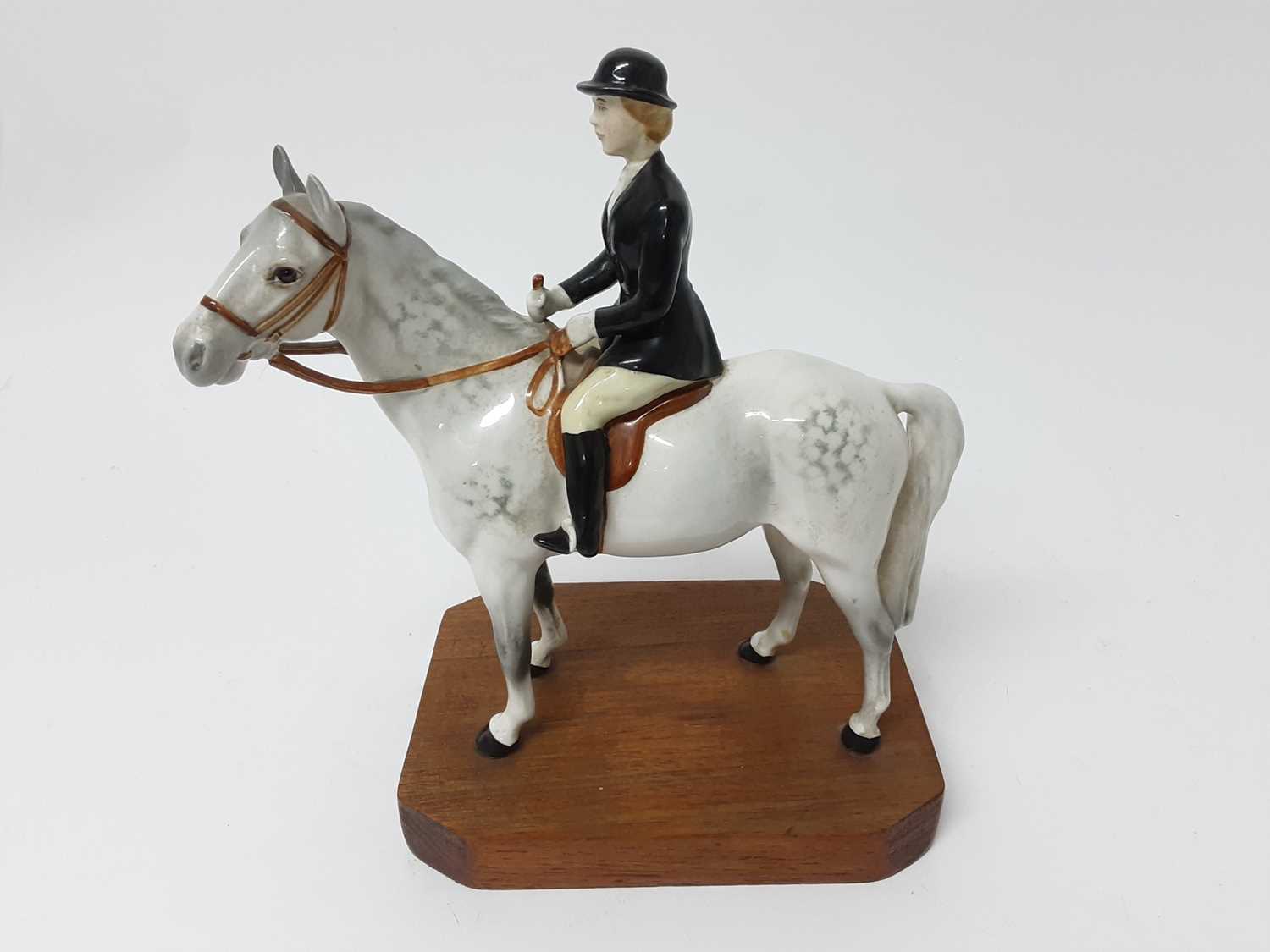 Lot 1108 - Beswick horse with female rider, on plinth base