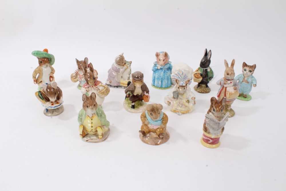 Lot 1123 - Collection of fourteen Beswick Beatrix Potter figures - Little Black Rabbit, Appley Dapply, Tabitha Twitchit and Miss Moppet, Johnny Town-Mouse with Bag, Peter with Postbag, Lady Mouse, Tom Kitten,...