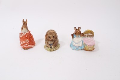 Lot 1124 - Collection of fourteen Beswick Beatrix Potter figures - Little Pig Robinson Spying, Jemima Puddleduck, Hunca Munca, Foxy Whiskered Gentleman, Poorly Peter Rabbit, The Old Woman who lived in a Shoe...