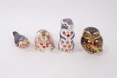 Lot 1132 - Four Royal Crown Derby paperweights including beaver and owl