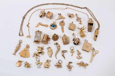 Lot 271 - Collection 9ct gold and yellow metal novelty charms and two whistle pendants on 9ct gold chains