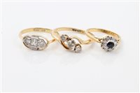 Lot 1634 - Gold (18ct) diamond three stone crossover ring,...