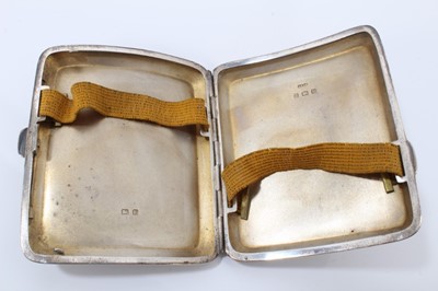 Lot 110 - 1930s silver cigarette case, two silver vesta cases and a silver stamp case (4)