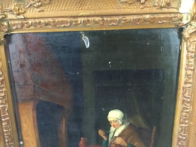 Lot 96 - Follower of Teniers, 19th century, oil on panel, Seated figure in an interior, 24.5 x 19cm, gilt frame