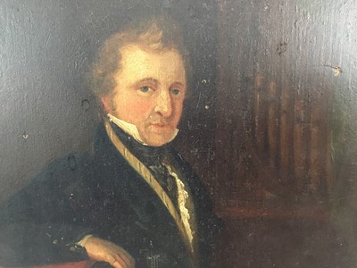 Lot 101 - English School, circa 1830, half length portrait of a Gentleman seated before an organ with music manuscript in hand, indistinctly inscribed in pencil verso, 30 x 23cm