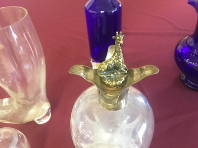 Lot 139 - Edwardian glass spirit decanter with silver collar and plated stopper, silver mounted oil and vinegar bottle, Bristol blue glass jug and other glassware