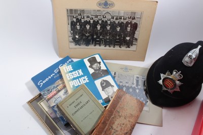 Lot 896 - Collection of Essex Police and other related items to include Hand cuffs, Police badges, Police helmet, Book- The Justices' Pocket Manual, 1845 and other items (1 box)