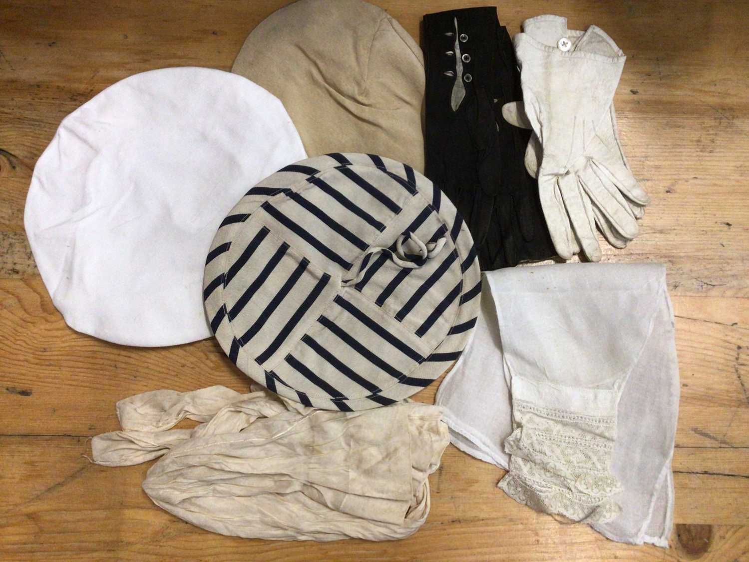 Lot 2060 - Edwardian accessories including a pair of fine lawn detachable sleeves with lace cuffs, tape lace blouse, child's chamios leather waistcoar, child's linen waistcoat with lace trim, pair of silk sto...
