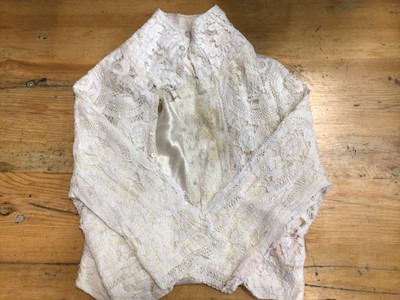 Lot 2060 - Edwardian accessories including a pair of fine lawn detachable sleeves with lace cuffs, tape lace blouse, child's chamios leather waistcoar, child's linen waistcoat with lace trim, pair of silk sto...