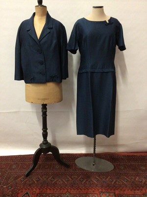 Lot 2210 - 1960's blue dress suit, jacket is cropped with three buttons and bow detail.