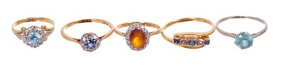 Lot 546 - Five gold and gem-set dress rings