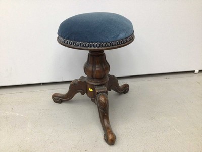 Lot 979 - Victorian mahogany piano stool with blue upholstered seat on tripod base and a tiled top table and another piano stool (3)