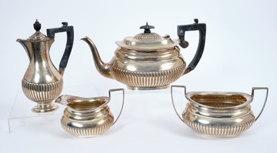 Lot 330 - Victorian silver three piece tea set and a matching silver hot water jug