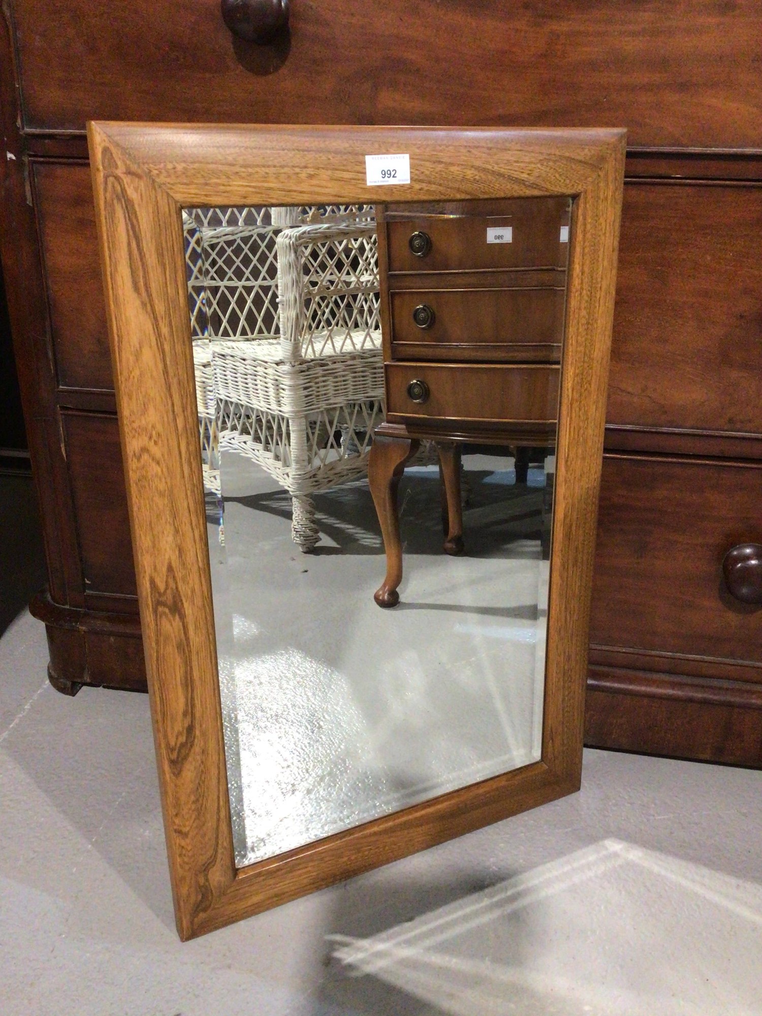 Lot 992 - Good quality bevelled wall mirror in Ercol