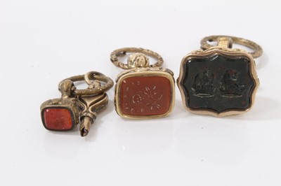Lot 7 - Collection of six antique hard stone seals in gilt metal mounts