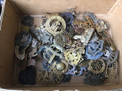 Lot 789 - Collection of approximately 70 British Military cap badges including Suffolk Regiment, Royal Welch Fusiliers and Essex Regiment  (some copies noted)