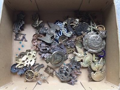 Lot 795 - Collection of approximately 50 British Military cap badges including Middlesex Reigment, The Essex Regiment and The Royal Irish Regiment (some copies noted)