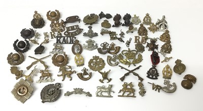 Lot 797 - Collection of approximately 60 British Military cap badges including Army Catering Corps, Leicestershire Regiment and RAF (some copies noted)