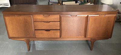 Lot 1003 - Mid century Greaves & Thomas teak sideboard with three drawers and three cupboards