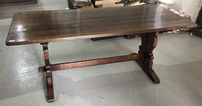 Lot 990 - Good quality oak refectory table on pierced shaped end standards joined by stretcher