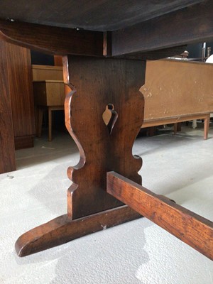 Lot 990 - Good quality oak refectory table on pierced shaped end standards joined by stretcher