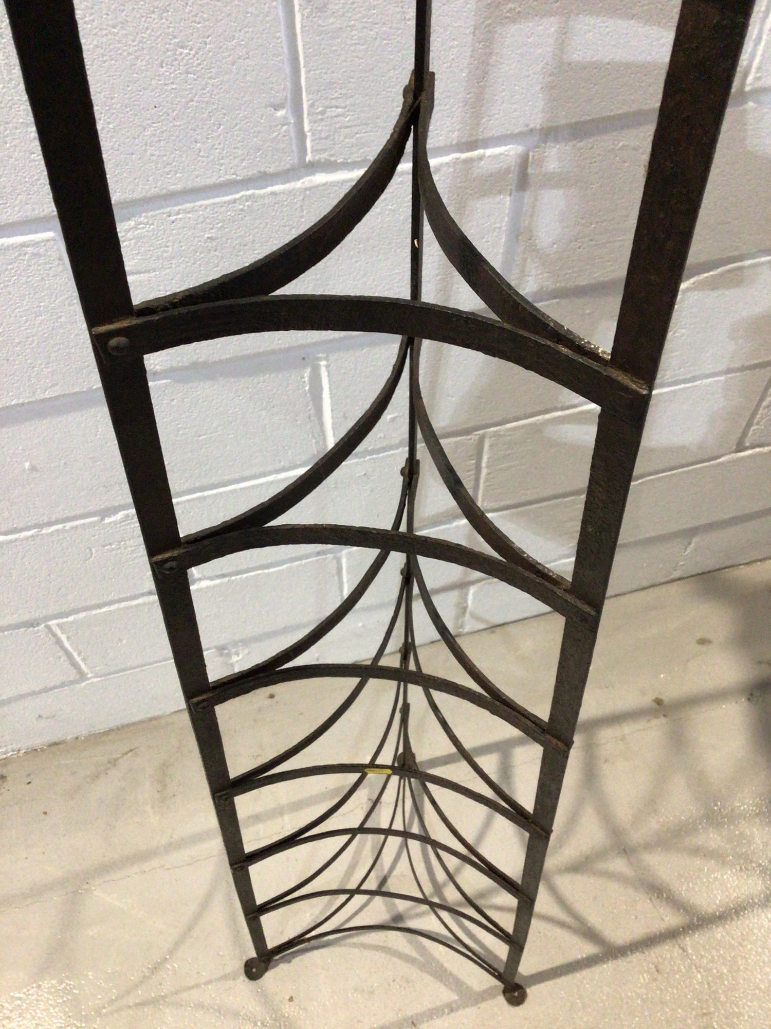 Lot 1076 - Wrought iron eight tier pot stand of