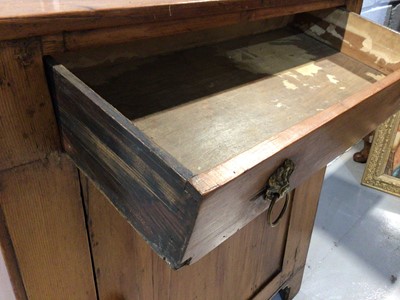 Lot 1012 - Old pine cupboard with single drawer and panelled door below on bracket feet