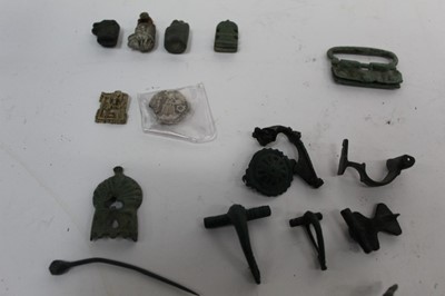 Lot 2356 - Roman and medieval artefacts found in England, to include brooches, bronze key heads, knife handles x 4, crossbow bolts x 2, and other items