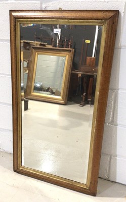Lot 1017 - Bevelled wall mirror in maple frame with gilt slip