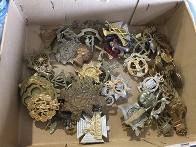 Lot 812 - Collection of approximately 50 British Military cap badges including Army Cyclist Corps, RAMC and 12th Lancers (some copies noted)