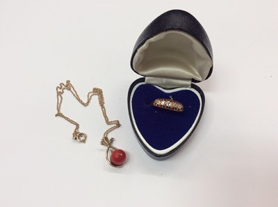 Lot 715 - Early 20th century 18ct gold and diamond five stone ring (London 1915) and a coral pendant on chain.