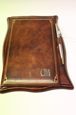 Lot 2765 - Asprey leather desk blotter with pen.