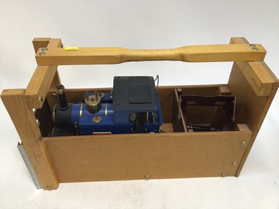 Lot 2411 - Scratchbuilt metal model locomotive 0-6-0 electrcally wired blue, black & red livery housed in wooden handmade carrying case